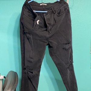 Black ripped skating pants